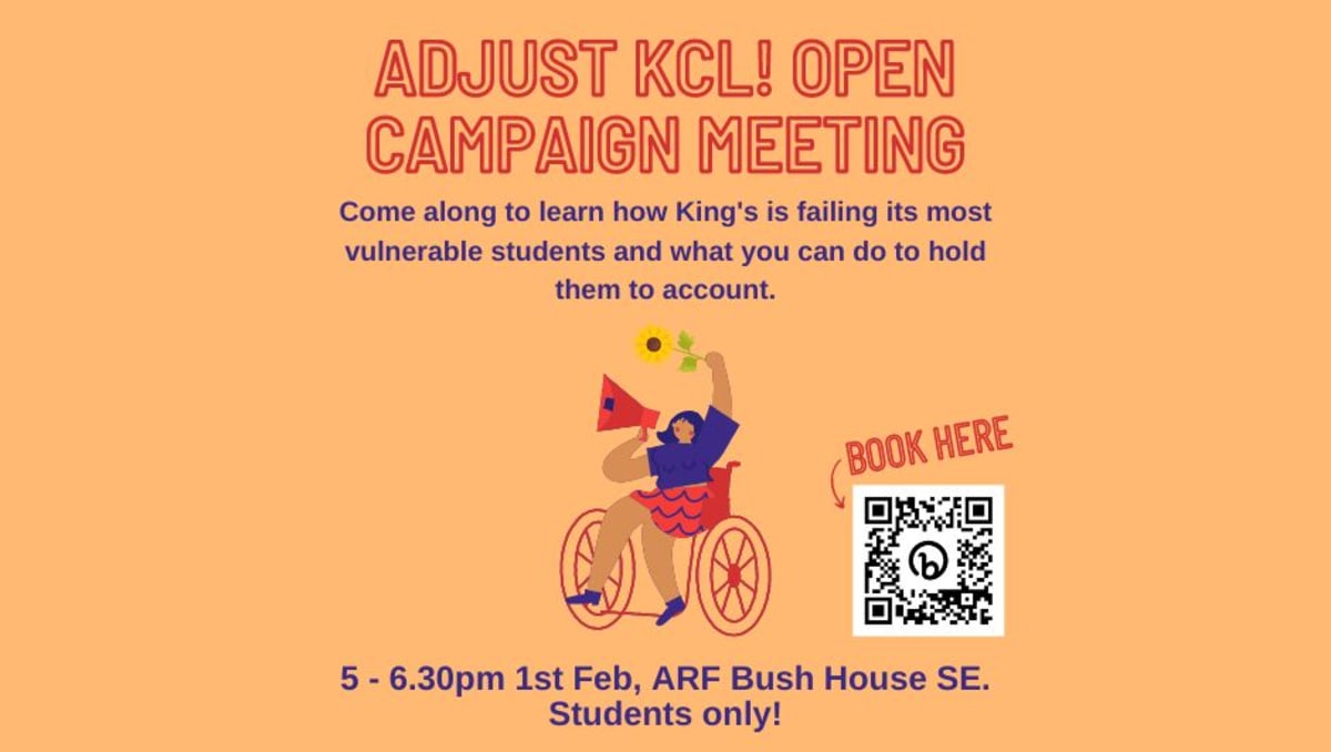 A group of students huddle round a table with paper and pens, planning a campaign.